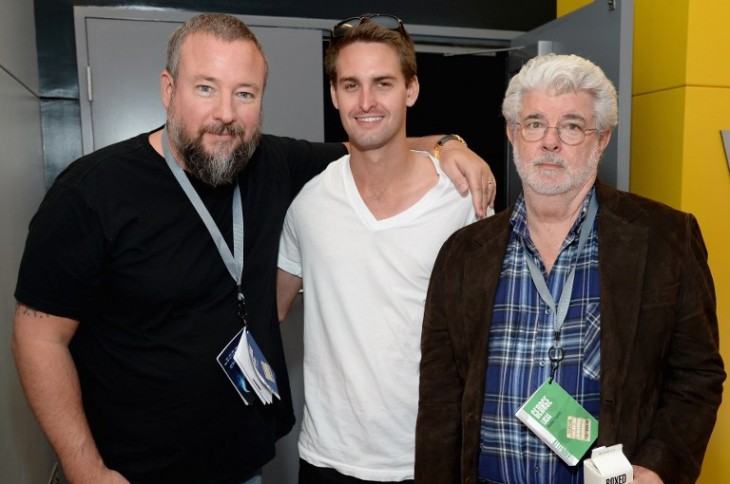 Junto al cofundador de VICE Shane Smith y el cineasta George Lucas | Michael Kovac | Getty Images | AFP