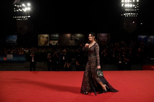 Actress Monica Bellucci attends the Premiere of the movie "Na Mlijecnom Putu" (On the Milky Road) presented in competition at the 73rd Venice Film Festival on September 9, 2016 at Venice Lido. / AFP PHOTO / TIZIANA FABI