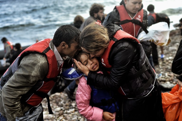 Refugees and migrants arrive at the Greek island of Lesbos after crossing the Aegean sea from Turkey on October 2, 2015. UN Secretary-General Ban Ki-moon welcomed the European Union