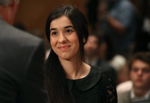 WASHINGTON, DC - JUNE 21: Nadia Murad, (C), human rights activist, arrives at a Senate Homeland Security and Governmental Affairs Committee hearing on Capitol Hill, June 21, 2016 in Washington, DC. The committee heard testimony "The Ideology of ISIS," and examining ISIS ideology and how it relates to the most recent terror attack in Orlando. Mark Wilson/Getty Images/AFP