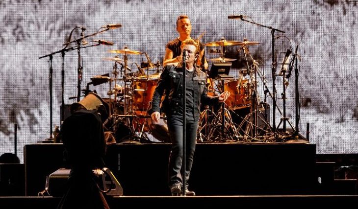 VANCOUVER, BC - MAY 12: (L-R) Bono and Larry Mullen Jr. of rock band U2 perform on stage during their 'The Joshua Tree World Tour' opener at BC Place on May 12, 2017 in Vancouver, Canada. Andrew Chin/Getty Images/AFP