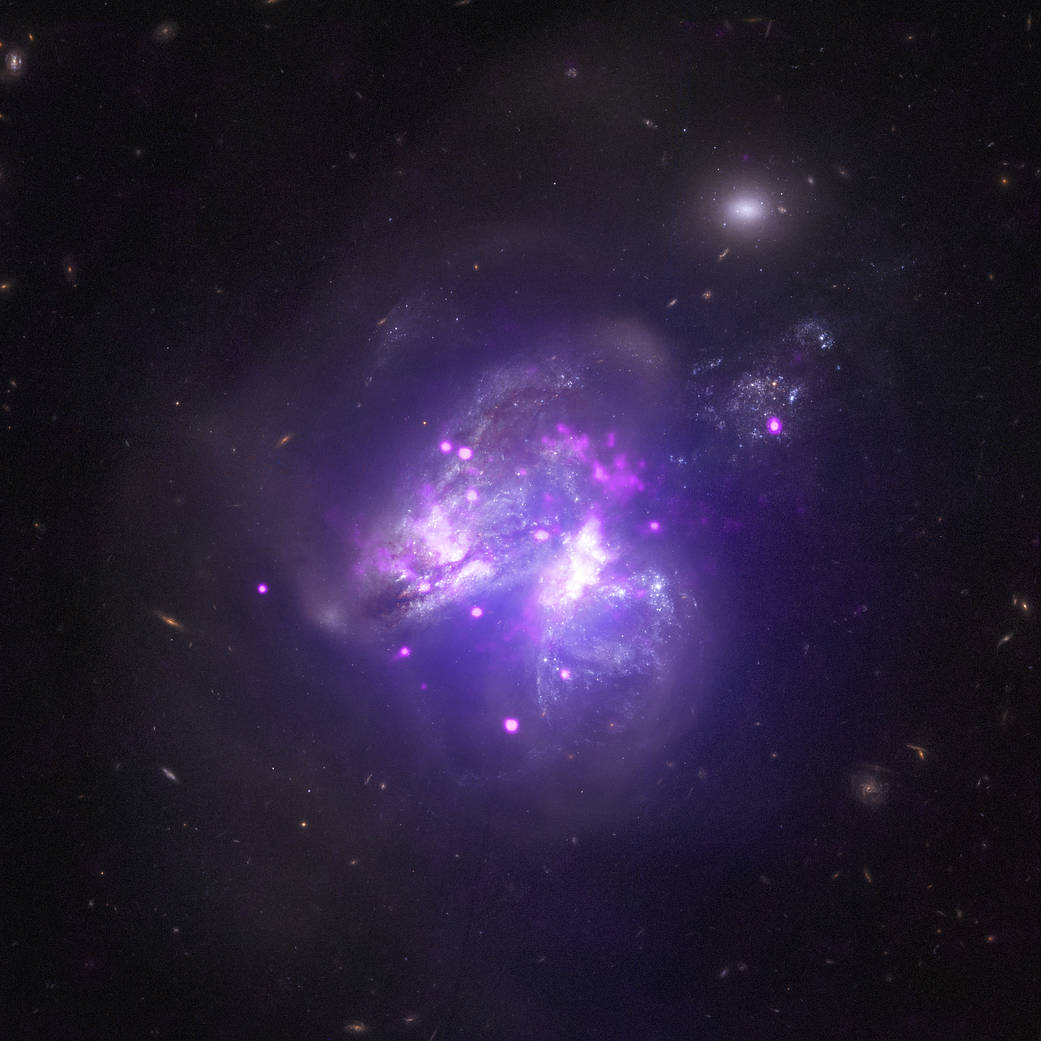 Dos galaxias fusionándose en el sistema Arp 299 | NASA