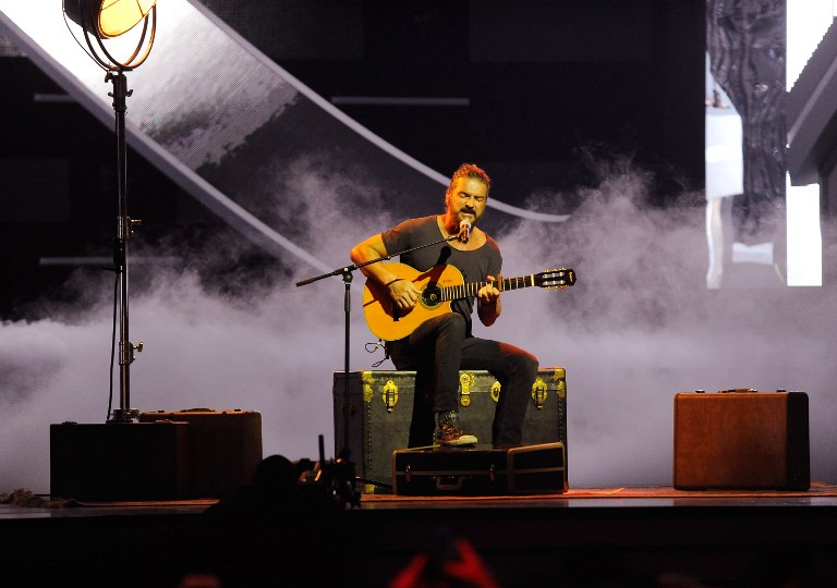 Ricardo Arjona en los Billboard Latin Music Awards | AFP | Sergi Alexander