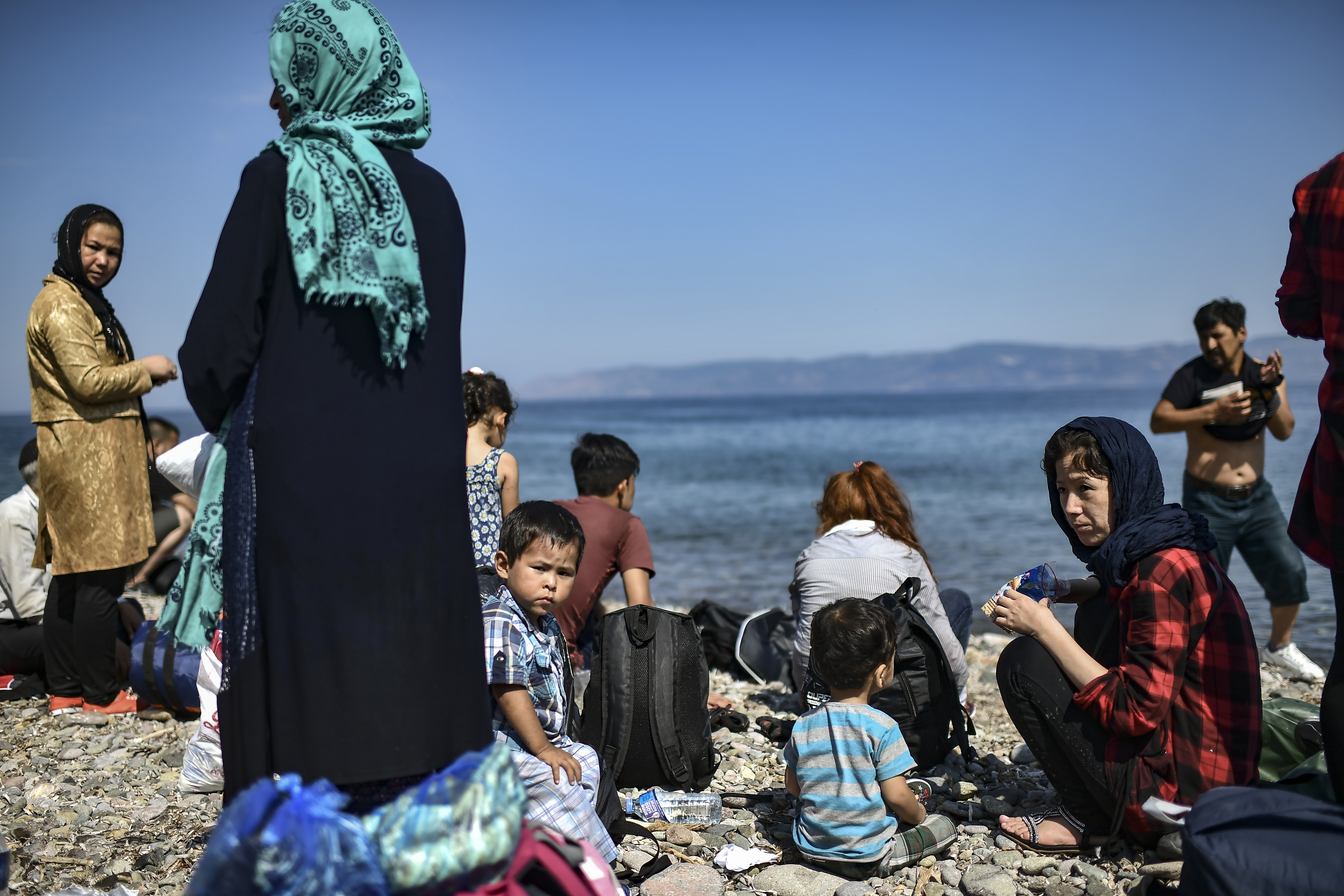 Migrantes tras cruzar el mar Egeo | Aris Messinis | Agence France-Presse