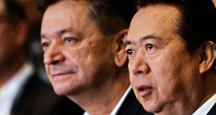 En primer plano, Meng Hongwei. Atrás, Alexander Prokopchuk | Roslan Rahman | Agence France-Presse