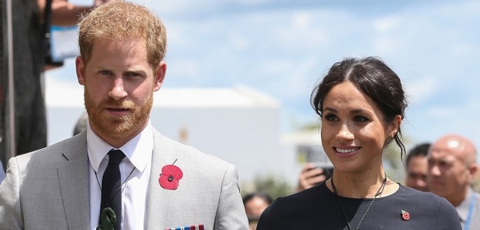 Britain’s Prince Harry (L) and his wife Meghan (R), the Duchess of Sussex, arrive on Te Papaiouru Marae in Rotorua on October 31, 2018. (Photo by DAVID ROWLAND / POOL / AFP)