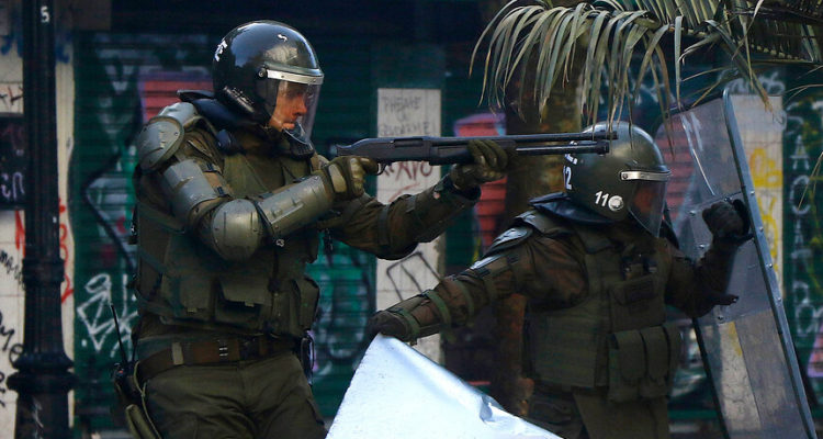 G-3 con una escopeta antidisturbios | Mario Dávila | Agencia UNO