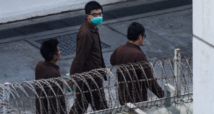 Joshua Wong (al centro) |Anthony Wallace | Agence France-Presse