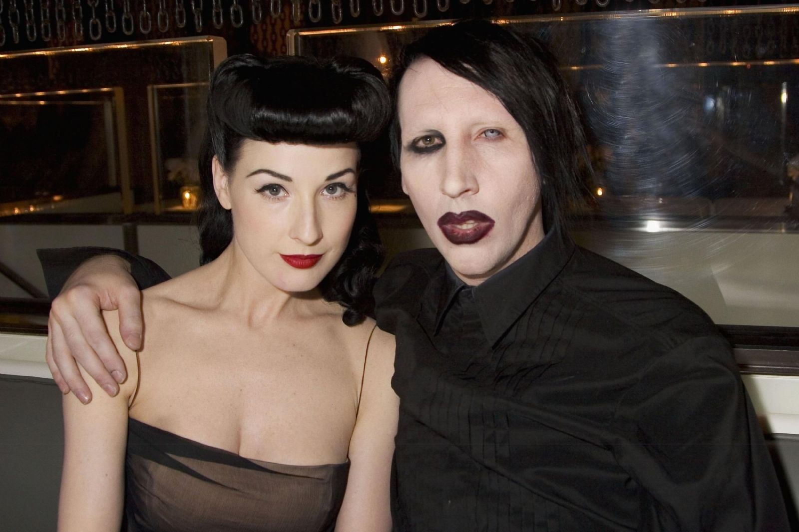Dita Von Teese y Marilyn Manson | AFP