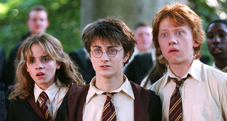 Emma Watson, Rupert Grint y Daniel Radcliffe vestidos como Hermione, Ron y Harry.