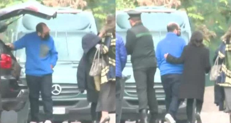 Nicolás López sacando sus pertenencias de su automovil para luego ingresar a Santiago 1.