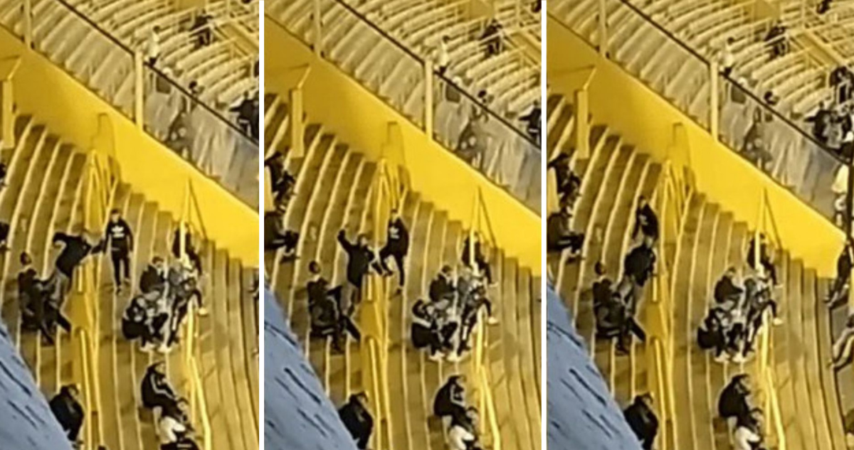 Hincha de Boca Juniors realizando gestos racistas.