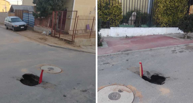 Vecinos de la comuna de Villa Alemana para alertar a conductores de socavon pusieron un palo