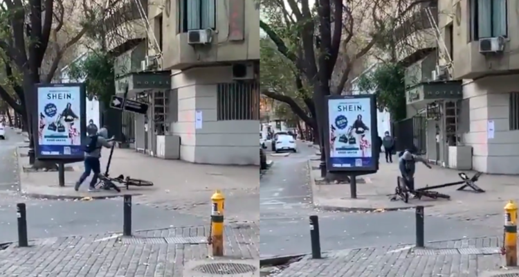 Graban descarado robo de bicicleta en Santiago: delincuente derribó una señal de tránsito