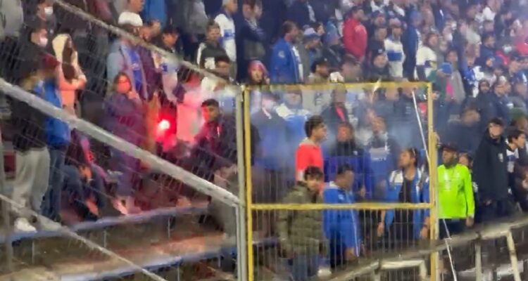 Universidad Católica anunció derecho de admisión al hincha que lanzó bengala a torcedores de Flamengo.