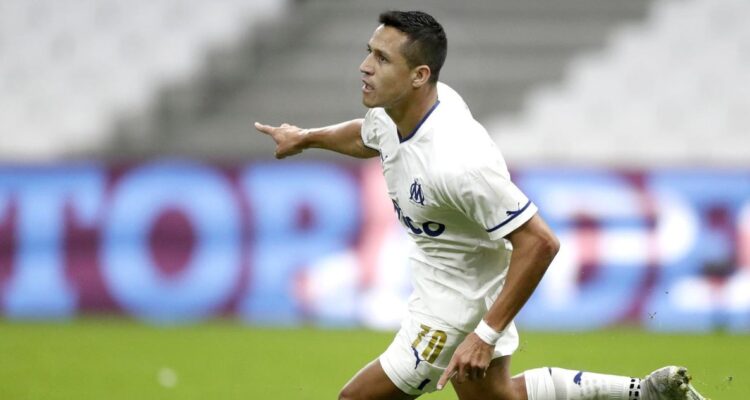 El chileno Alexis Sánchez celebra su gol para Marsella ante Sporting en Champions