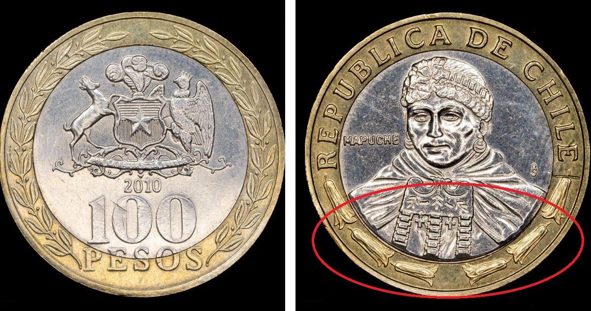 Moneda de 100 pesos chilenos con el diseño de los copihues