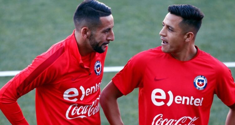 Mauricio Isla y Alexis Sánchez
