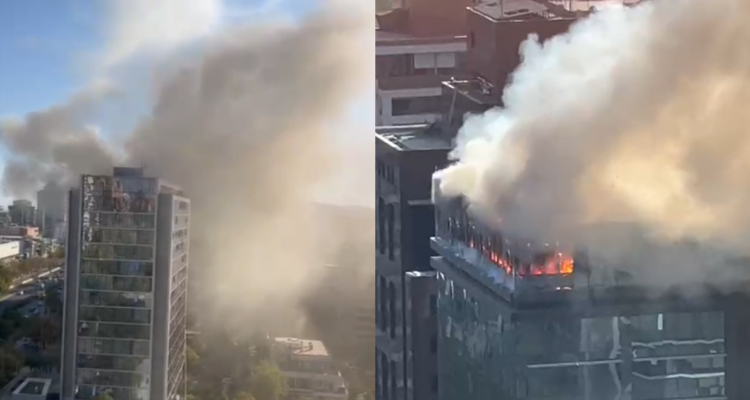 Gran incendio afecta a edificio en Vitacura: hay desprendimiento de vidrios