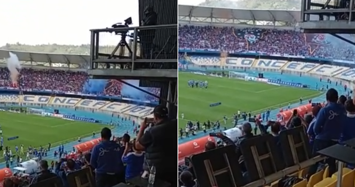 Artificios caen en el estadio Ester Roa Rebolledo en el clásico universitario.