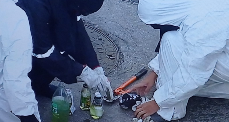 Sujetos con overoles blancos protagonizan incidentes con bombas molotov afuera del Instituto Nacional