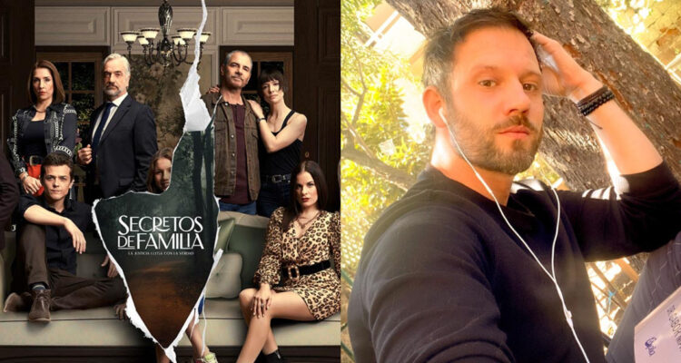 Hernán Contreras posa serio para la cámara. A su lado, el póster de la teleserie Secretos de Familia.