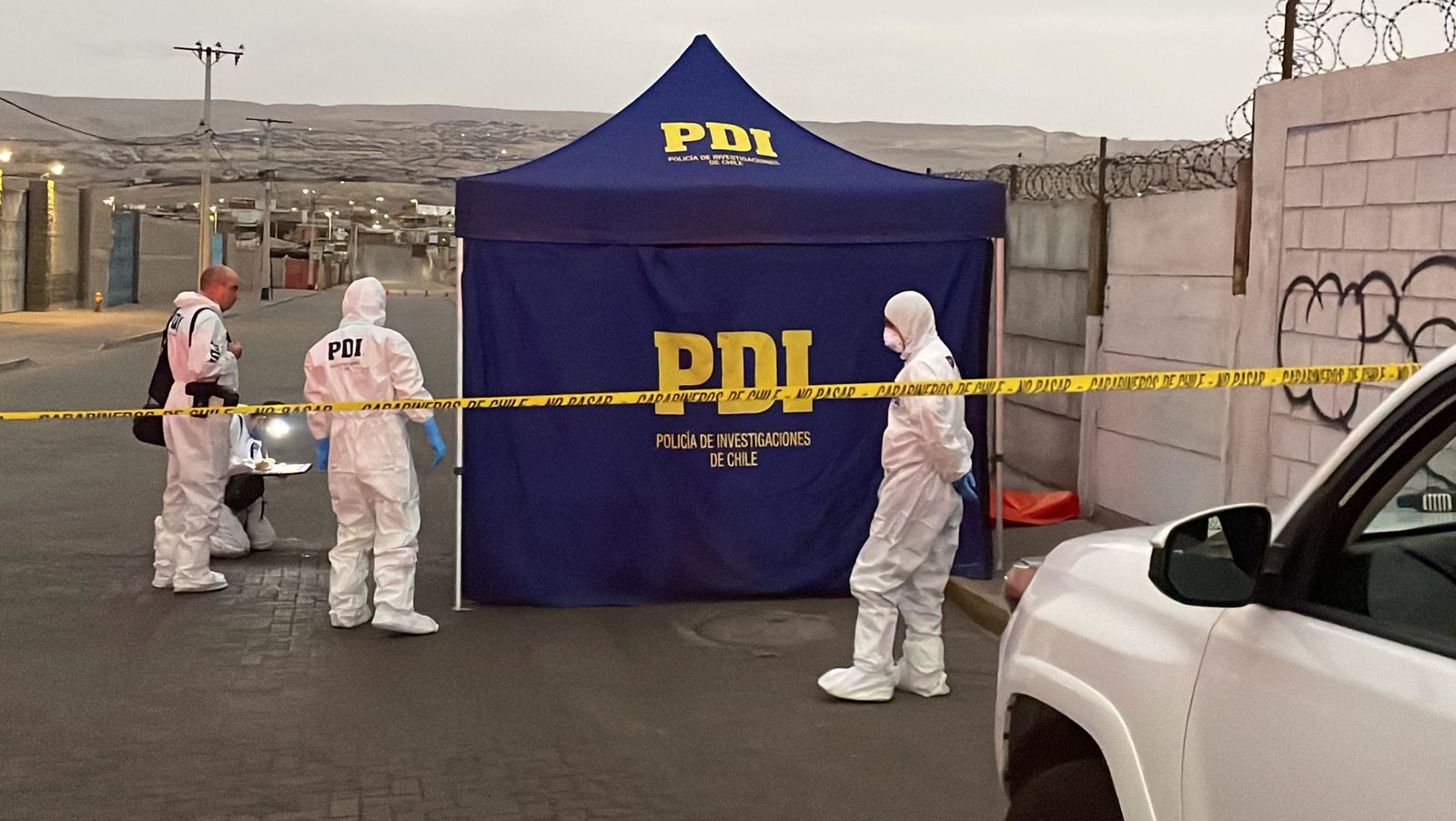 PDI trabajando en el lugar del homicidio en Arica.