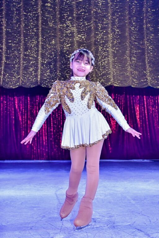 niña circo sobre hielo