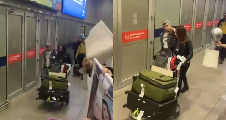 Francisco Arenas de Gran Hermano llegando al aeropuerto de Santiago.