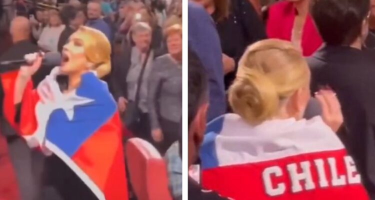 Adele sorprende al cantar con una bandera de Chile en un concierto en Las Vegas, entregada por fanaticada chilena.