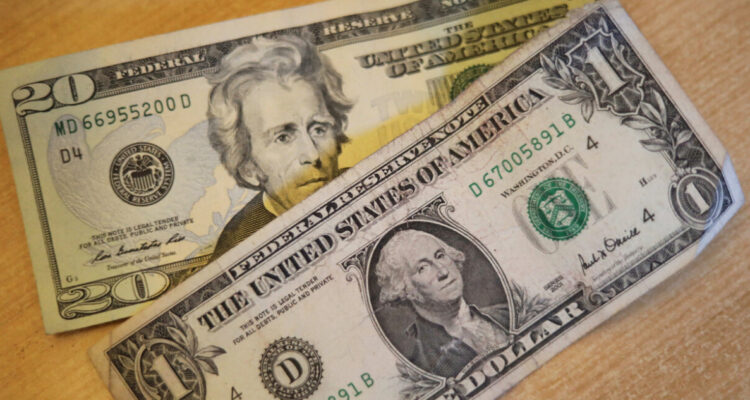 Billetes de 20 y 1 dólar