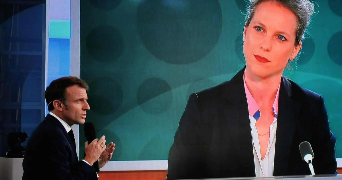Entrevista de Macron en France 2, con imagen de fondo de candidata Lucie Castets | RFI
