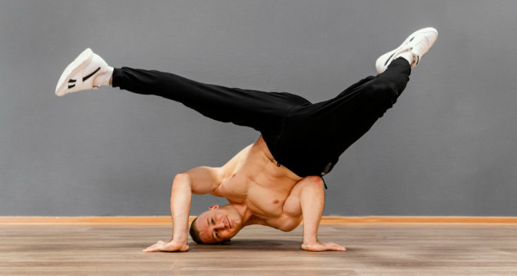 Bailarín de Breakdance haciendo Headspin en referencia a tumor