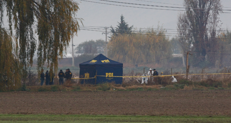 PDI en zona rural, donde ocurrió un homicidio
