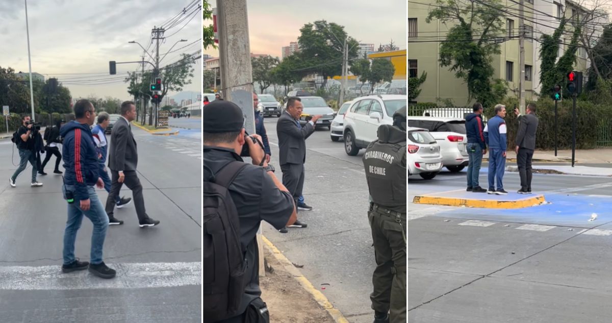 Oficial de Conmebol tomando fotos y pruebas tras ataque de hinchas de La U a bus de Lanús