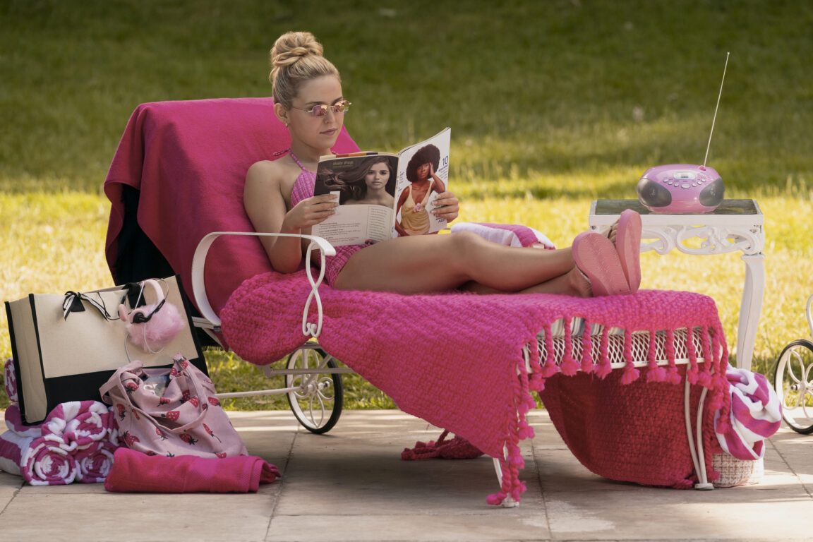 Elle tomando sol
