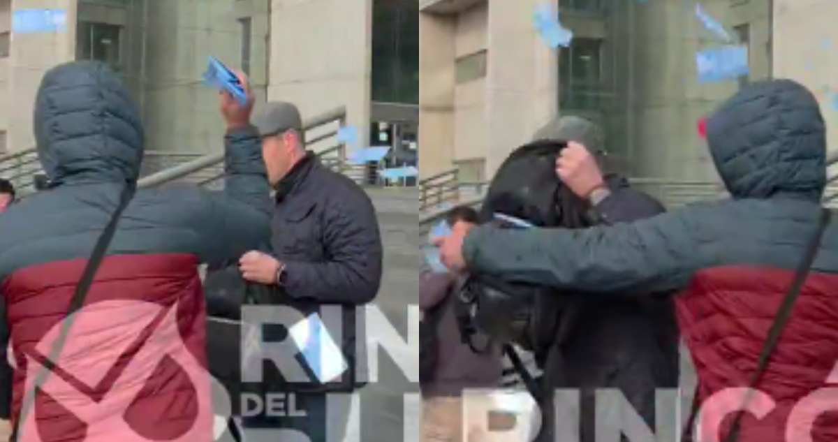 Michael Clark vs barristas de La U en centro de justicia